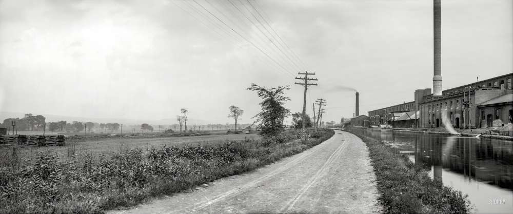 Photo showing: This Smoky Eden -- Circa 1905. Erie Canal and Mohawk Valley, Utica, N.Y. Panorama of two 8x10 inch glass negatives.