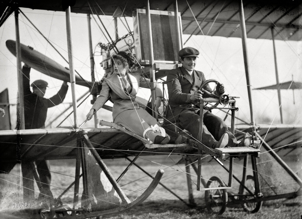 Photo showing: Come Fly With Me -- Senorita Lenore Riviero with Antony Jannus in Rex Smith aeroplane, Washington, D.C., or vicinity circa 1911.
