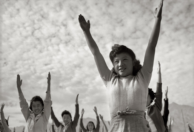 Photo showing: At Manzanar -- Calisthenics at Manzanar War Relocation Center, California, 1943.