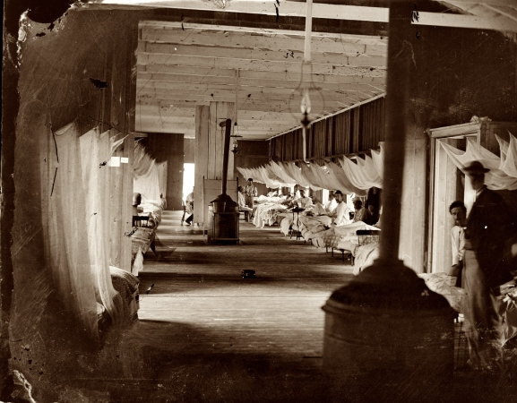 Photo showing: Shadowland: 1863 -- Washington, D.C., circa 1863. Wounded soldiers at Harewood Hospital with mosquito netting over their beds. 