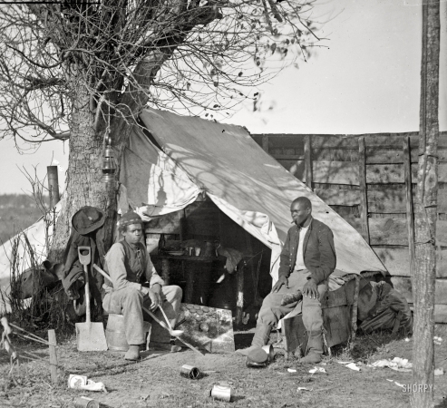 Photo showing: Contrabands -- November 1863. Culpeper, Virginia (vicinity). Contrabands [runaway slaves].