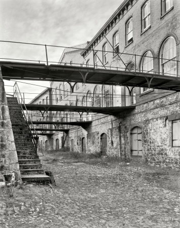 Photo showing: Stoddards Upper Range -- Savannah, Ga. circa 1937. Italianate structure built 1859 by John Stoddard for cotton factor's offices and warehouses.