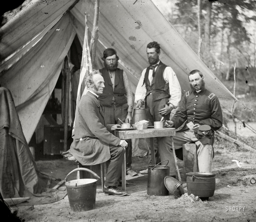 Photo showing: Coffee Break -- May 1862. Yorktown, Virginia (vicinity). Group before the photographic tent at Camp Winfield Scott.