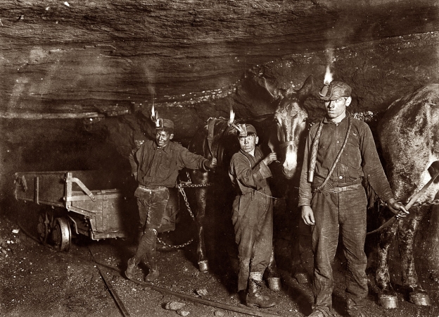 Photo showing: Tunnel Vision -- September 1908. Gary, West Virginia. Drivers and Mules in a coal mine.