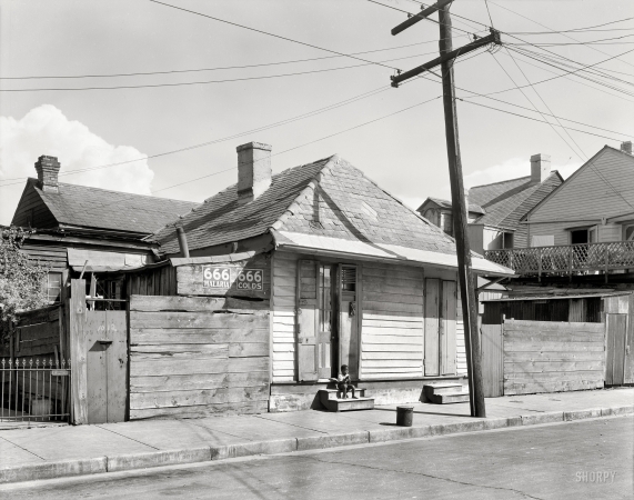 Photo showing: Liberty Street -- New Orleans, Louisiana, circa 1937. Liberty Street cottages.