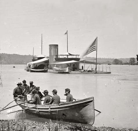 Photo showing: U.S.S. Onondaga -- 1864. James River, Virginia. Monitor U.S.S. Onondaga; soldiers in rowboat.