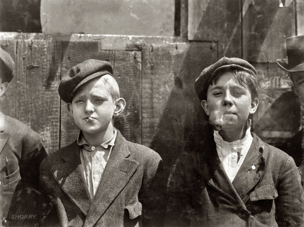 Photo showing: They Were All Smoking -- 11 a.m. May 9, 1910. St. Louis, Missouri. Newsies at Skeeter's branch. They were all smoking.