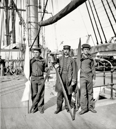 Photo showing: Navy Signalmen -- Circa 1865. Signalmen of Rear Admiral John A. Dahlgren's flagship receiving a message from the Georgia shore.