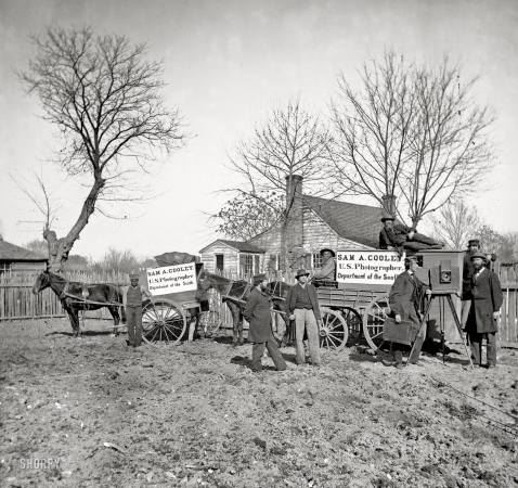 Photo showing: Sam Cooley -- Circa 1865. Wagons and camera of Sam A. Cooley, U.S. photographer, Department of the South.