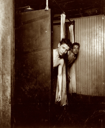 Photo showing: All Washed Up -- New York, July 1910. Postal Telegraph Co. messengers, 283 Broadway. The boys make good use of the shower baths.