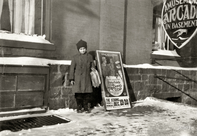 Photo showing: The Traffic Cop -- Dec. 17, 1916. Burlington, Vermont. Morris Levine, 11 years old and sells papers every day.