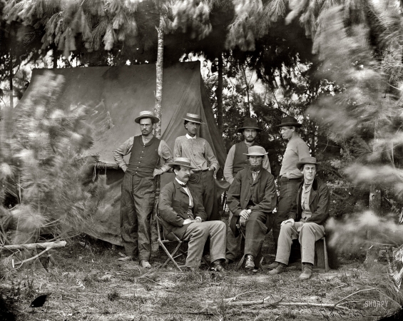 Photo showing: Telegraph Corps -- 1864. Petersburg, Virginia. Maj. Thomas T. Eckert (seated, left) and others of U.S. Military Telegraph Corps.