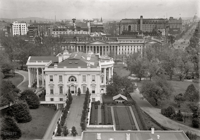 Photo showing: From the West Wing -- Unusual view of The White House and Rose Garden, Washington, D.C. 1914.