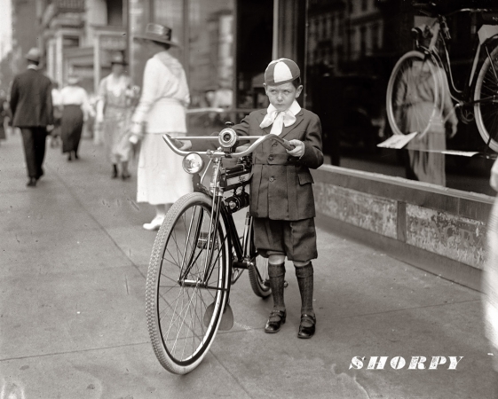 Photo showing: Beanie Biker -- Washington, D.C., 1921. Winner of a Mead Ranger bike for selling 30 Washington Times newspaper subscriptions.