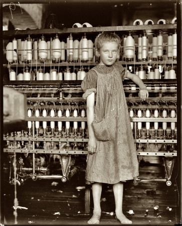 Photo showing: Addie Card -- February 1910. Addie Card, 12 years old, spinner in North Pownal Cotton Mill, Vermont.