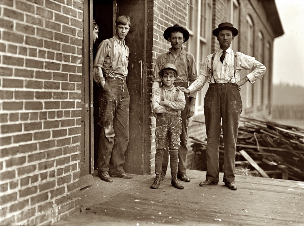 Photo showing: Payne Mill -- January 1909. Macon, Georgia. This boy has worked in Payne Cotton Mill for 2 yrs. Runs four sides and earns 52 cents a day. 
