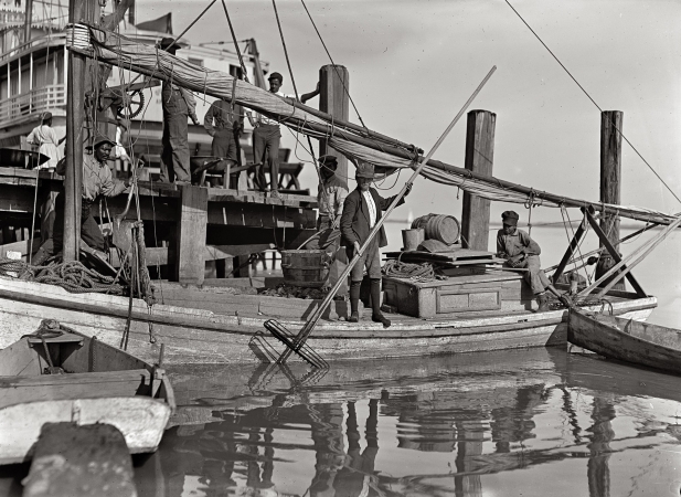 Photo showing: Oyster Boy -- January 1909. Apalachicola, Florida. Randsey Summerford, a young oyster fisher.
