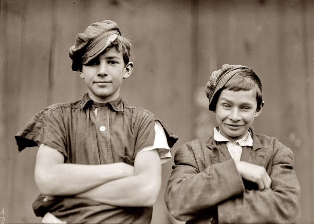 Photo showing: The Night Shift -- November 1909. Bridgeton, New Jersey. Two of the boys on night shift in the More-Jones Glass Co.