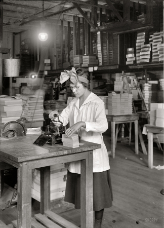 Photo showing: Miss Stamper -- January 31, 1917. Stamping labels. Boston Index Card Co., 113 Purchase Street.