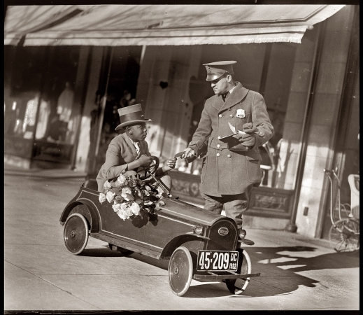 Photo showing: The Peony Express -- Washington, D.C. February 5, 1922. The flower shop auto is a battery-powered Custer Car.