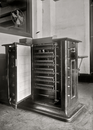 Photo showing: Data Processing: 1917 -- Census Bureau, Department of Commerce, tabulating machine, an early punch-card tabulator.