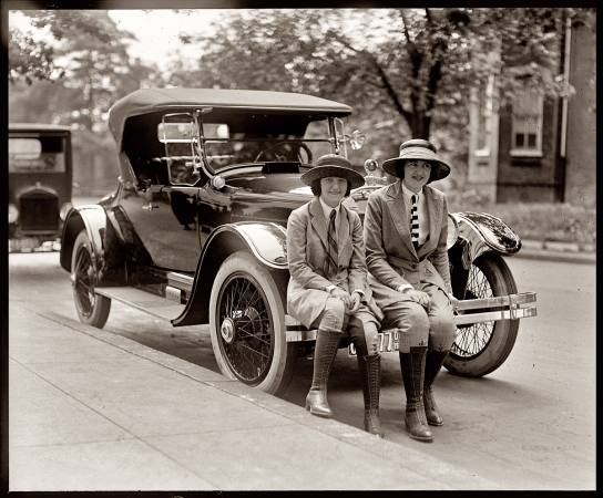 Photo showing: Dressed to Drive -- Miss Hazel Jones and Miss Marion Cameron in 1922.