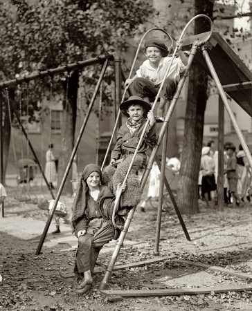 Photo showing: Little Rascals -- September 7, 1922. Washington, D.C. Children in costume on steps of sliding board.