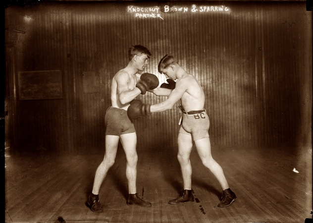 Photo showing: Knockout Brown -- Middleweight boxer George “Knockout” Brown (on right) and sparring partner circa 1912.  