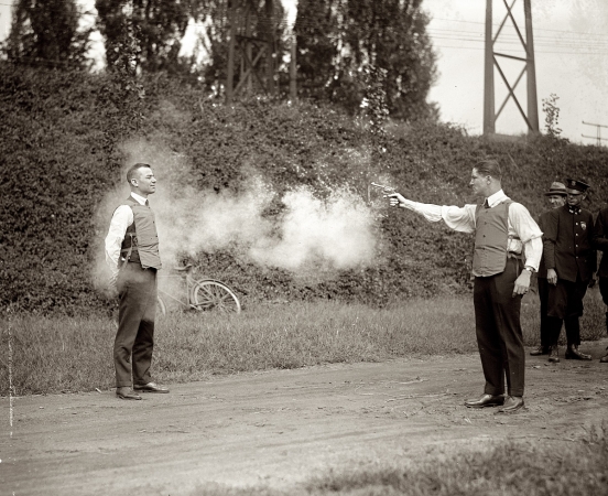 Photo showing: The Smoking Gun -- September 13, 1923. Washington, D.C. Testing bulletproof vest.
