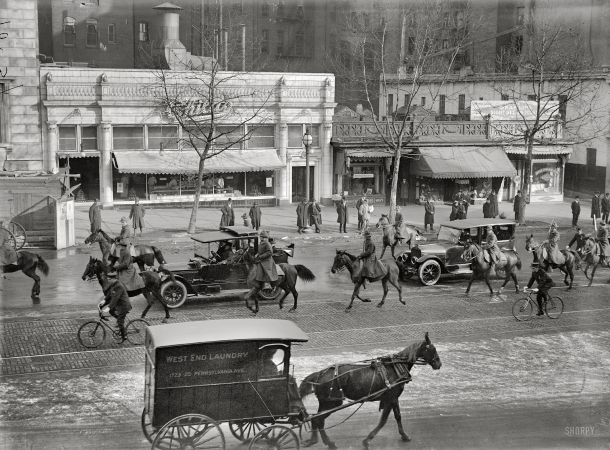 Photo showing: Pennsylvania Avenue Traffic -- Washington, D.C., 1918. Serbian delegation passing Childs' Restaurant, 1423 Pennsylvania Ave. N.W.