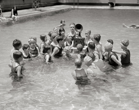 Photo showing: Do Not Use Near Water -- July 10, 1924. Washington, D.C. Radio at Wardman Park Hotel pool.