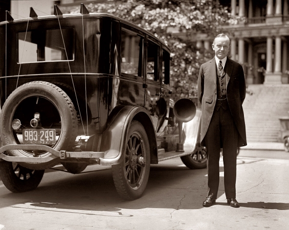 Photo showing: Coolidge and Car -- President Calvin Coolidge and his radio-equipped Buick. Washington, D.C. August 14, 1924.