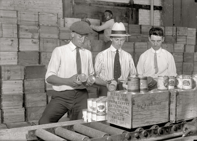 Photo showing: War and Peas -- Washington, D.C., 1919. Buying Army surplus food sold at fish market.