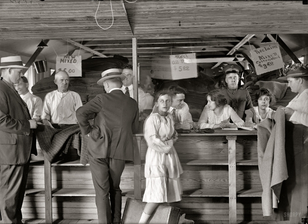 Photo showing: Army Surplus: 1919 -- Buying Army surplus food sold at fish market, Washington, D.C.