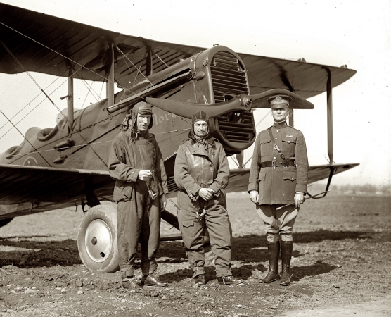 Photo showing: Billy Mitchell -- Feb. 20, 1925. Rep. P.B. O' Sullivan, Gen. Billy Mitchell and Maj. Henry B. Clagett with biplane at Bolling Field.