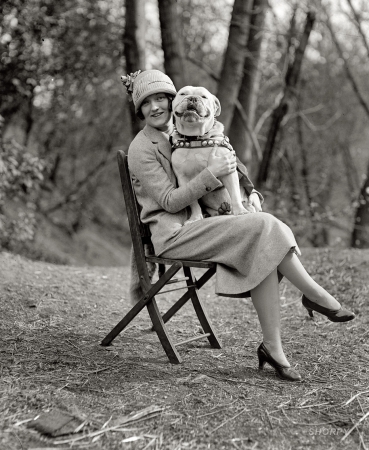 Photo showing: Mae and Jiggs -- April 14, 1925. Washington, D.C. Miss Mae Esterly with Sgt. Jiggs, the Marine Corps mascot.