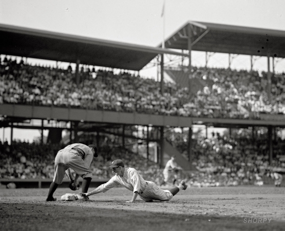 Photo showing: Bucky Touches Base -- Washington Nationals manager and second baseman Stanley Bucky Harris at Griffith Stadium in 1925.