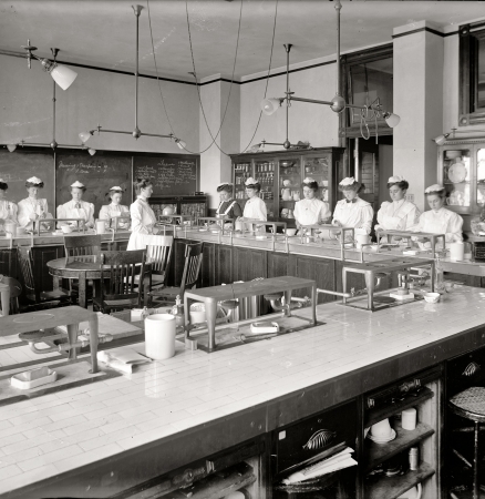 Photo showing: Housewifery 101 -- McKinley School lab. Home economics at McKinley High School in Washington circa 1910.
