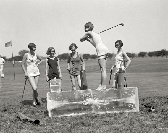 Photo showing: Iced Tee Time -- July 9, 1926. Golf in bathing suits -- icing off at the tee. Miss Dorothy Kelly teeing off on a cake of ice.