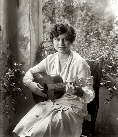 Photo showing: Nancy Hamilton -- The Washington, D.C., socialite, later Mrs. Victor Alfaro, in September 1926. She's playing a Regal tenor guitar.