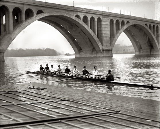 Photo showing: Rowing on the River: 1927 -- Washington, D.C. Central High shell crew on the Potomac at the Key Bridge.