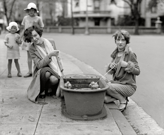 Photo showing: Just Ducky -- Do ducks swim? Misses Eugenia Dunbar and Mary Moose, Washington, D.C. April 21, 1927.