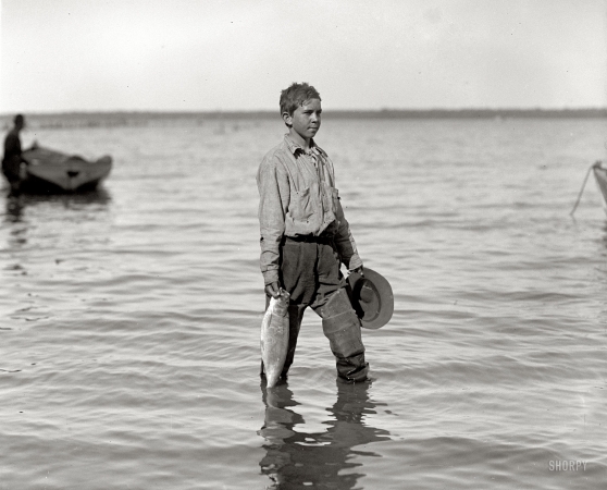 Photo showing: Shad Boy -- Washington, D.C., circa 1920. Shad fishing on the Potomac.
