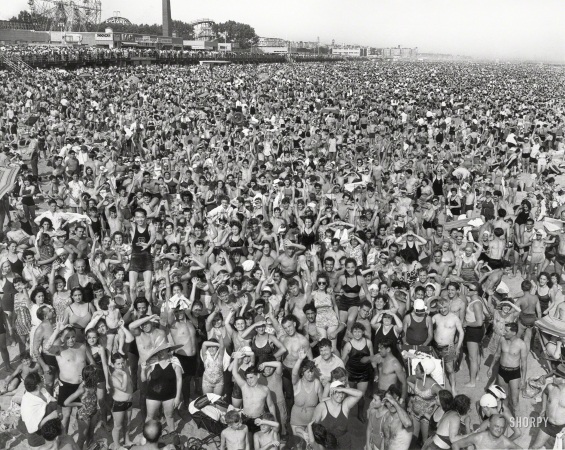 Photo showing: Pressing the Flesh -- New York, 1940. Crowd at Coney Island.