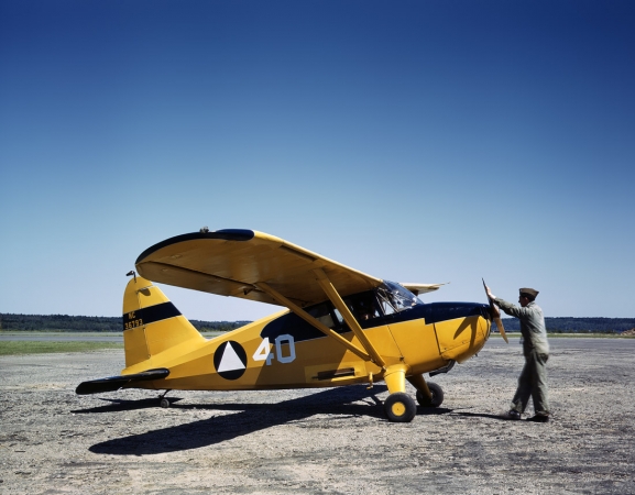 Photo showing: Ready for Takeoff -- June 1943. Civil Air Patrol plane (Stinson 10A) at Bar Harbor, Maine.