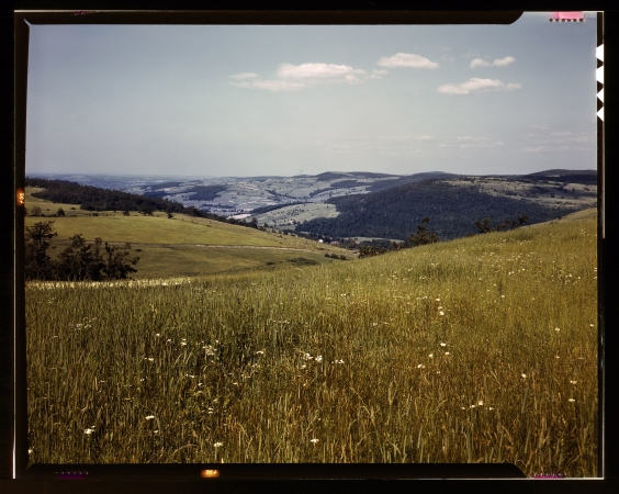 Photo showing: Clear Day in the Catskills -- June 1943. Richmondville, New York. Farmland meadow in the Catskill Mountains.