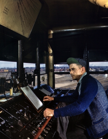Photo showing: The Man in Tower B -- May 1943. Melrose Park, Ill. Chicago & North Western towerman R.W. Mayberry of Elmhurst at the Proviso Yard.