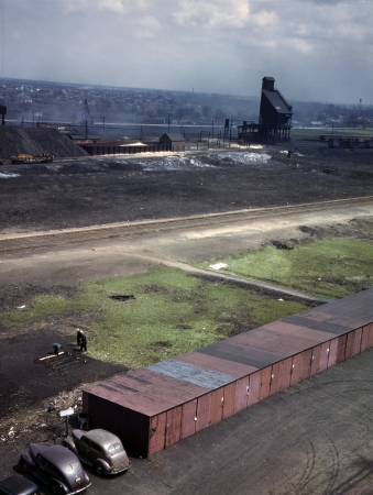 Photo showing: Railroad Victory Garden -- April 1943. Chicago & North Western RR railroad workers cultivating a little Victory garden at the Proviso Yard.