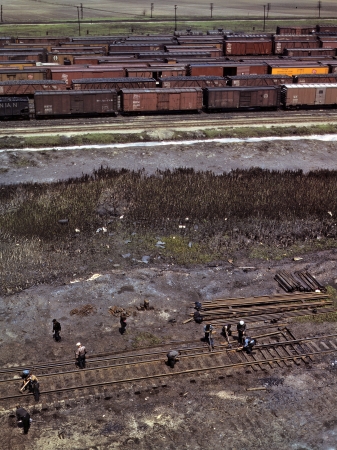 Photo showing: Bensenville -- May 1943. Bensenville, Illinois. Section crew of the Chicago, Milwaukee, St. Paul and Pacific Railroad taking up track.