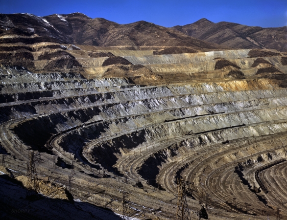 Photo showing: Open-Pit Copper -- November 1942. Bingham Canyon, Utah. Utah Copper Company mine works at Carr Fork.